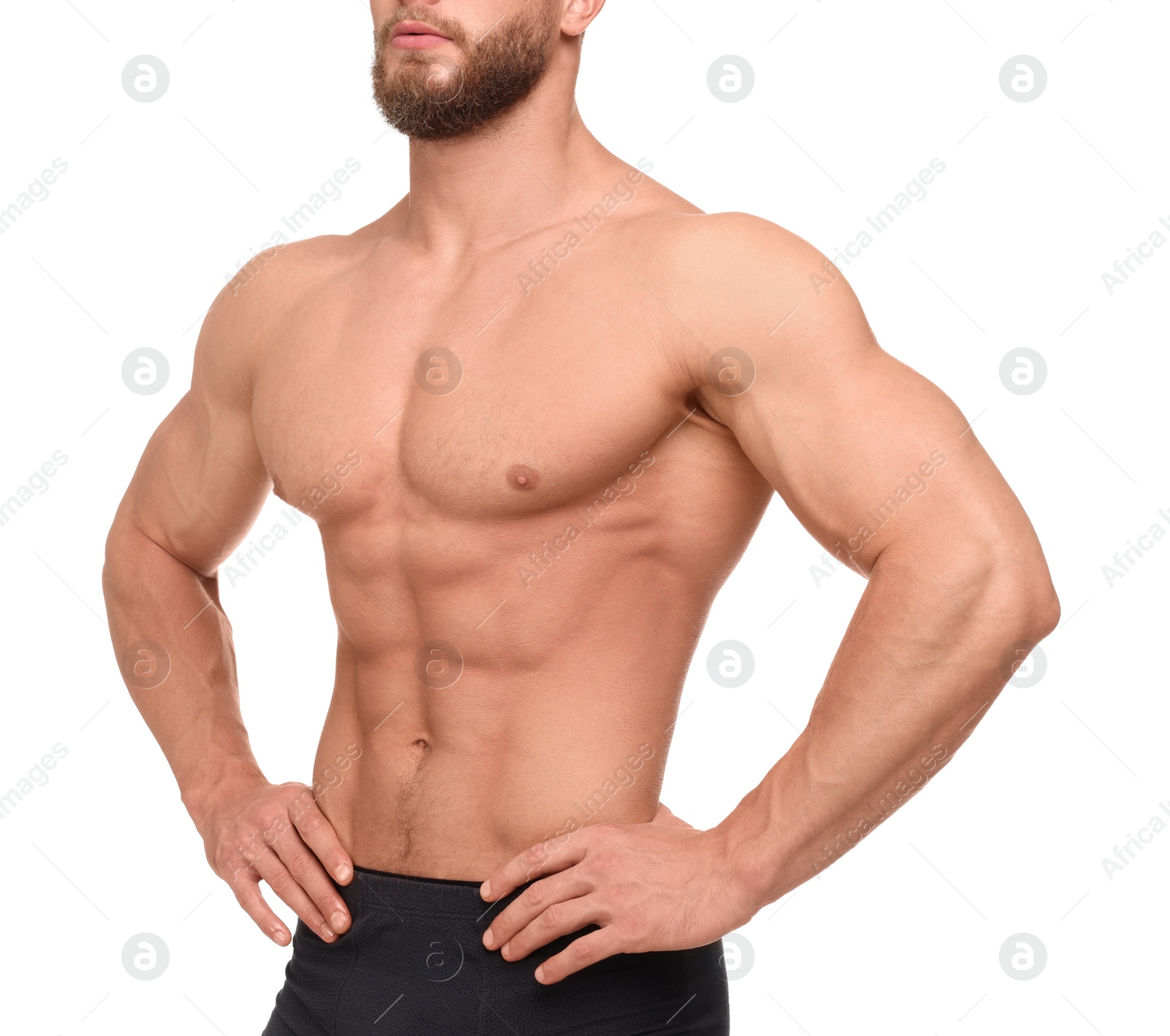 Photo of Muscular man showing abs isolated on white, closeup. Sexy body