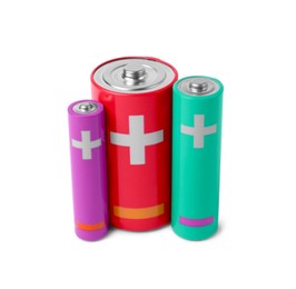Photo of Three different new batteries isolated on white