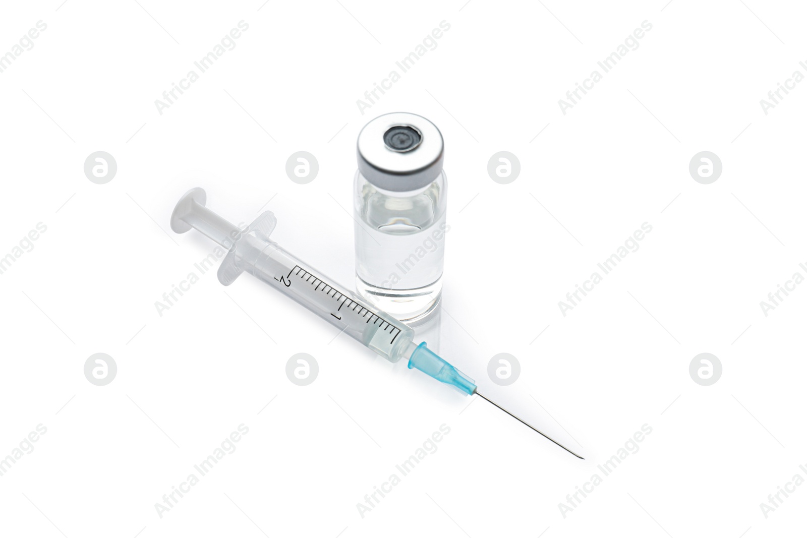 Photo of Disposable syringe with needle and vial on white background