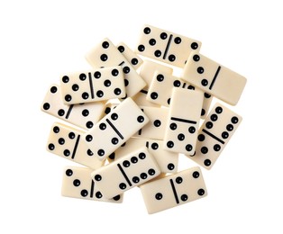 Pile of classic domino tiles on white background, top view