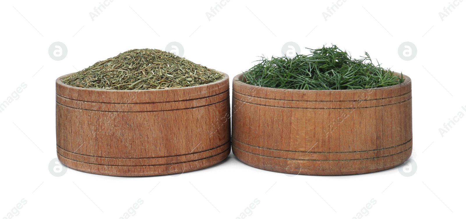 Photo of Bowls with aromatic dry and fresh dill on white background