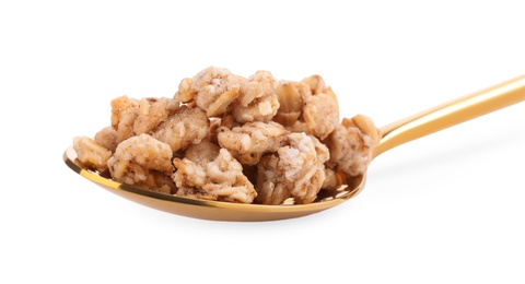 Tasty crispy granola in spoon on white background, closeup