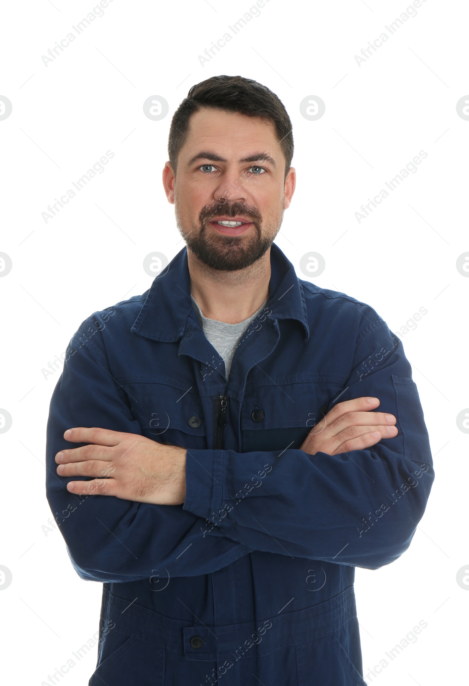 Photo of Portrait of professional auto mechanic on white background