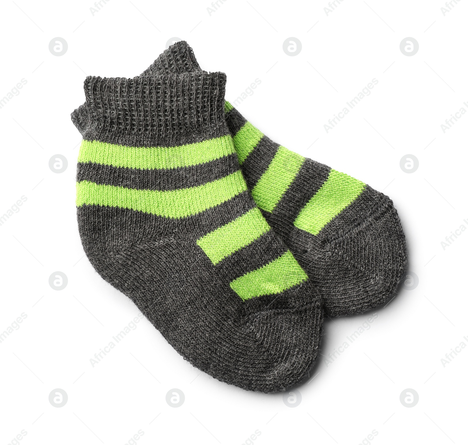 Photo of Cute child socks on white background, top view