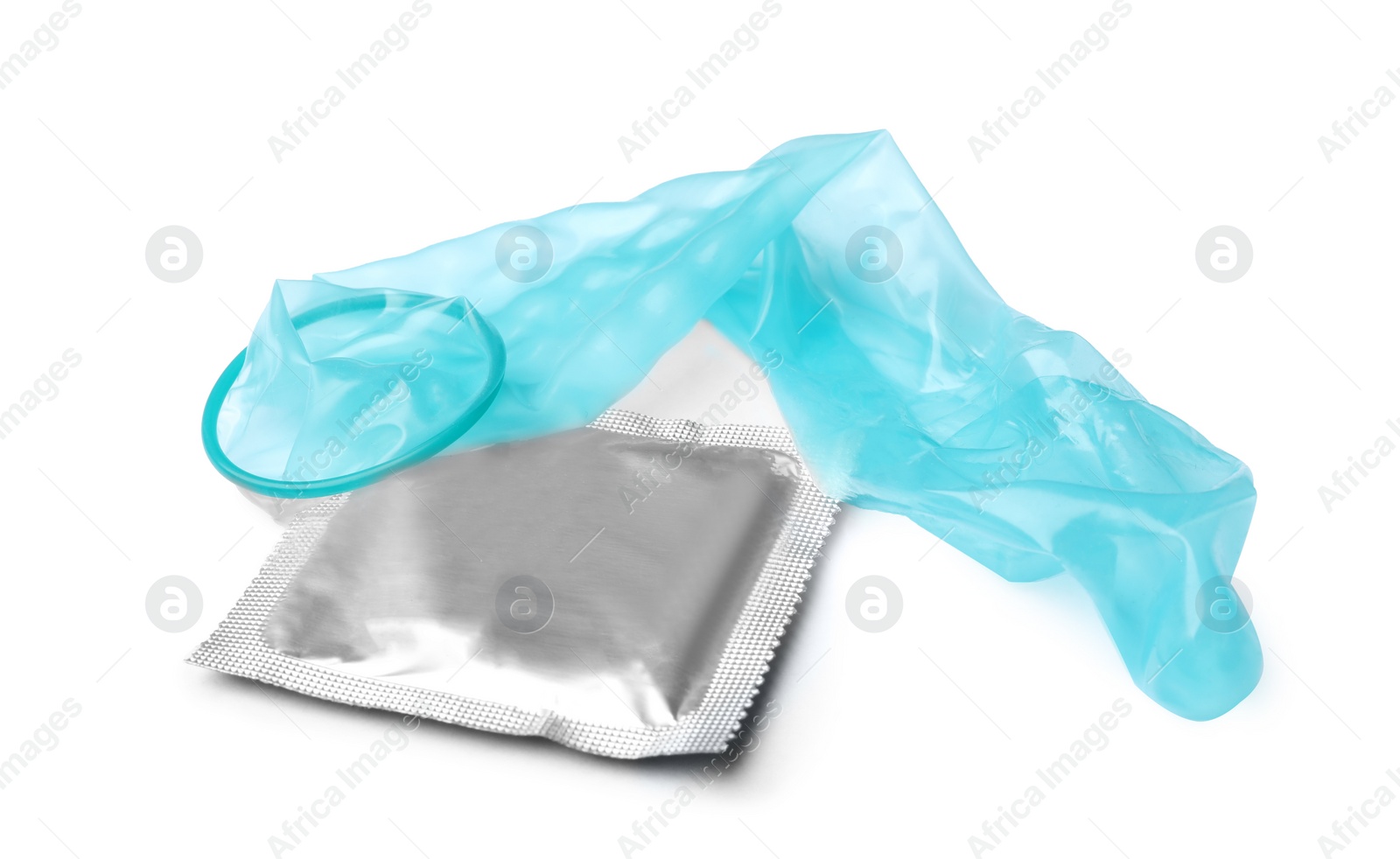 Image of Unrolled light blue condom and package on white background. Safe sex