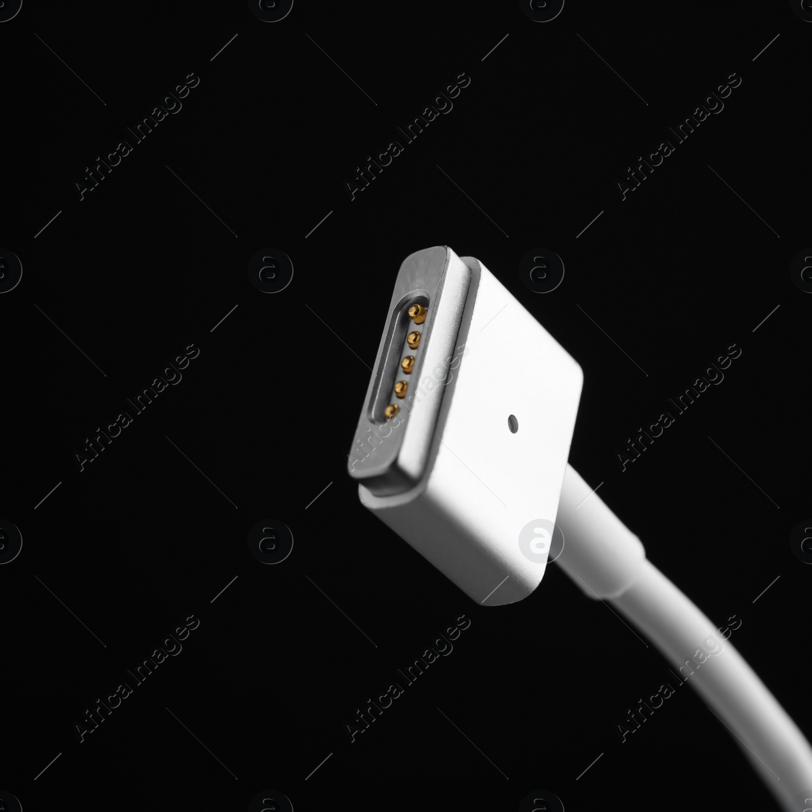 Photo of Charge cable on black background, closeup. Space for text