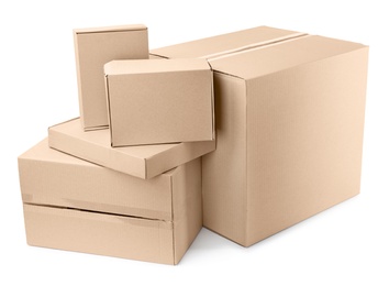 Photo of Pile of cardboard boxes on white background