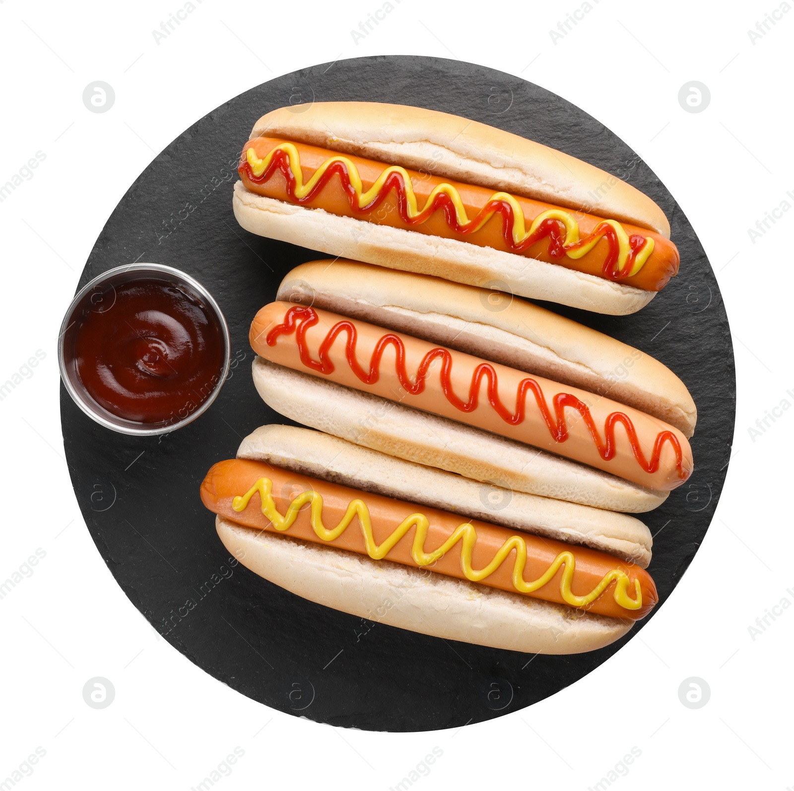 Photo of Delicious hot dogs with sauces isolated on white, top view