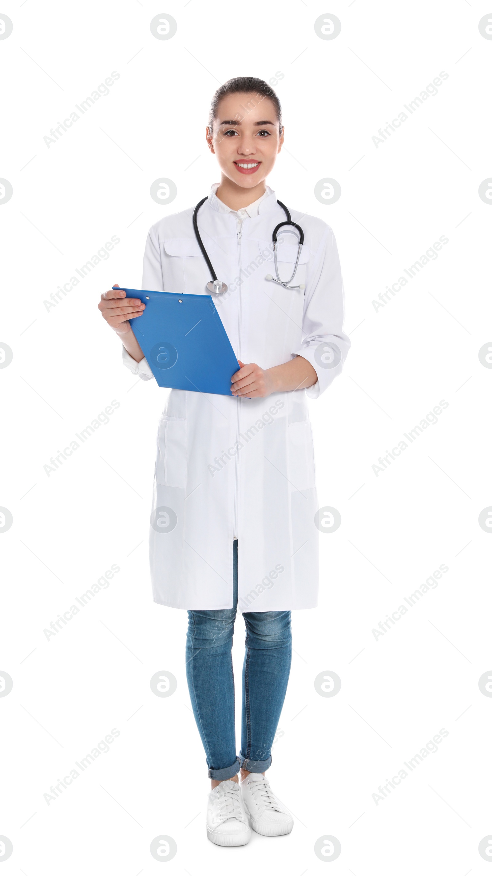 Photo of Full length portrait of medical doctor with clipboard and stethoscope isolated on white