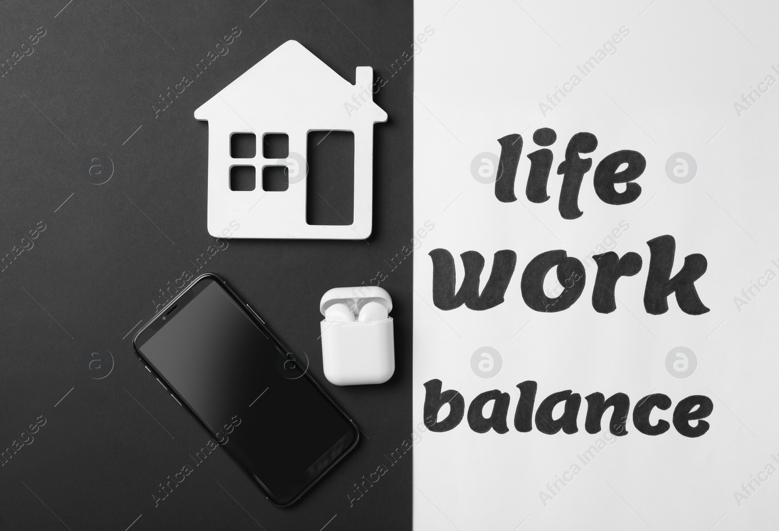 Photo of Wooden house, wireless earphones and smartphone on color background, flat lay. Life work balance concept