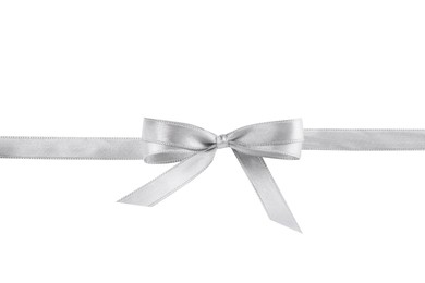 Photo of Silver satin ribbon with bow on white background, top view