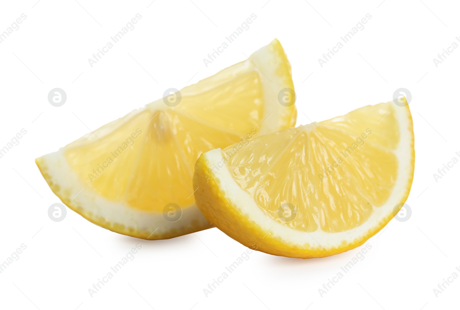 Photo of Pieces of fresh lemon isolated on white