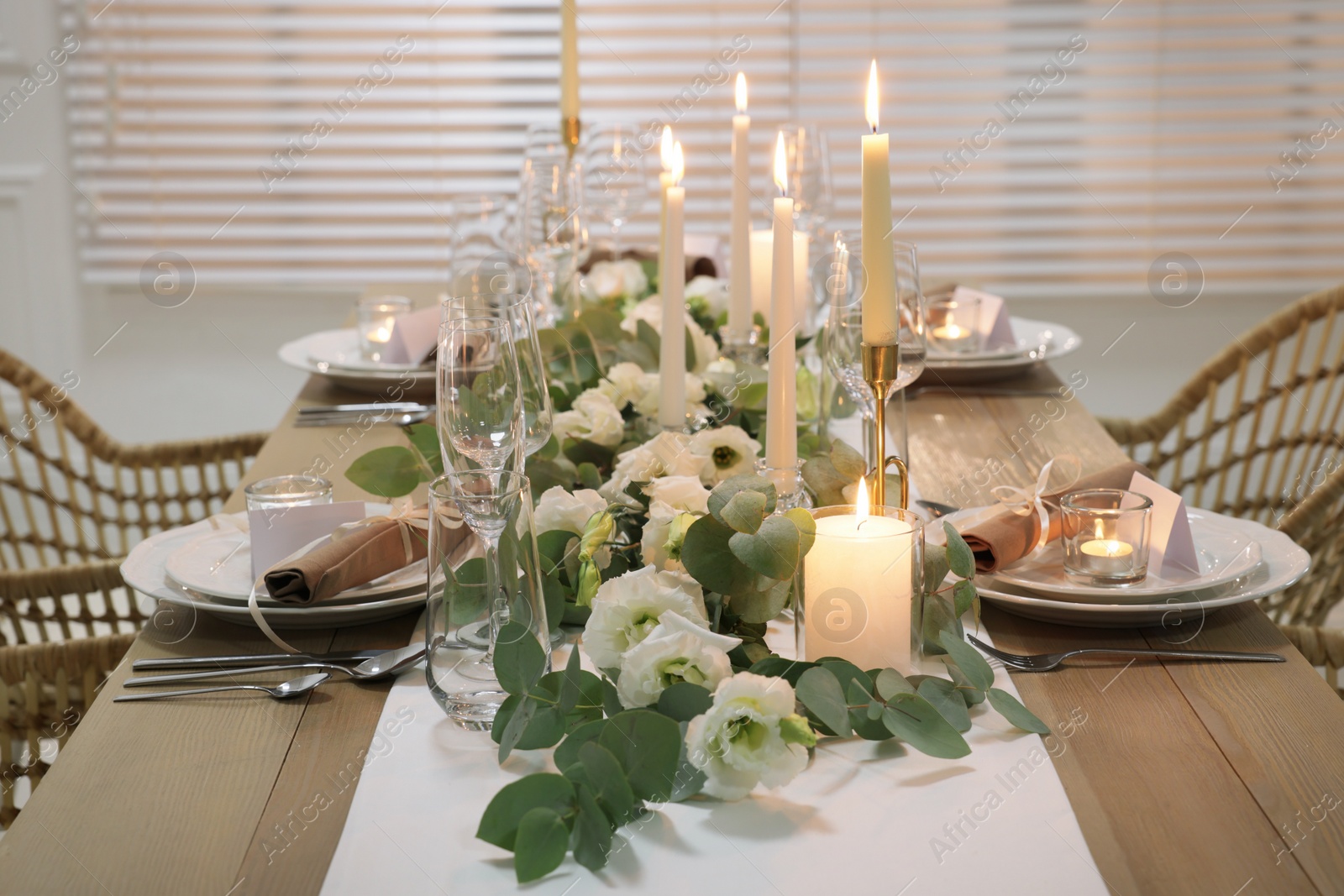 Photo of Festive table setting with beautiful tableware and decor indoors