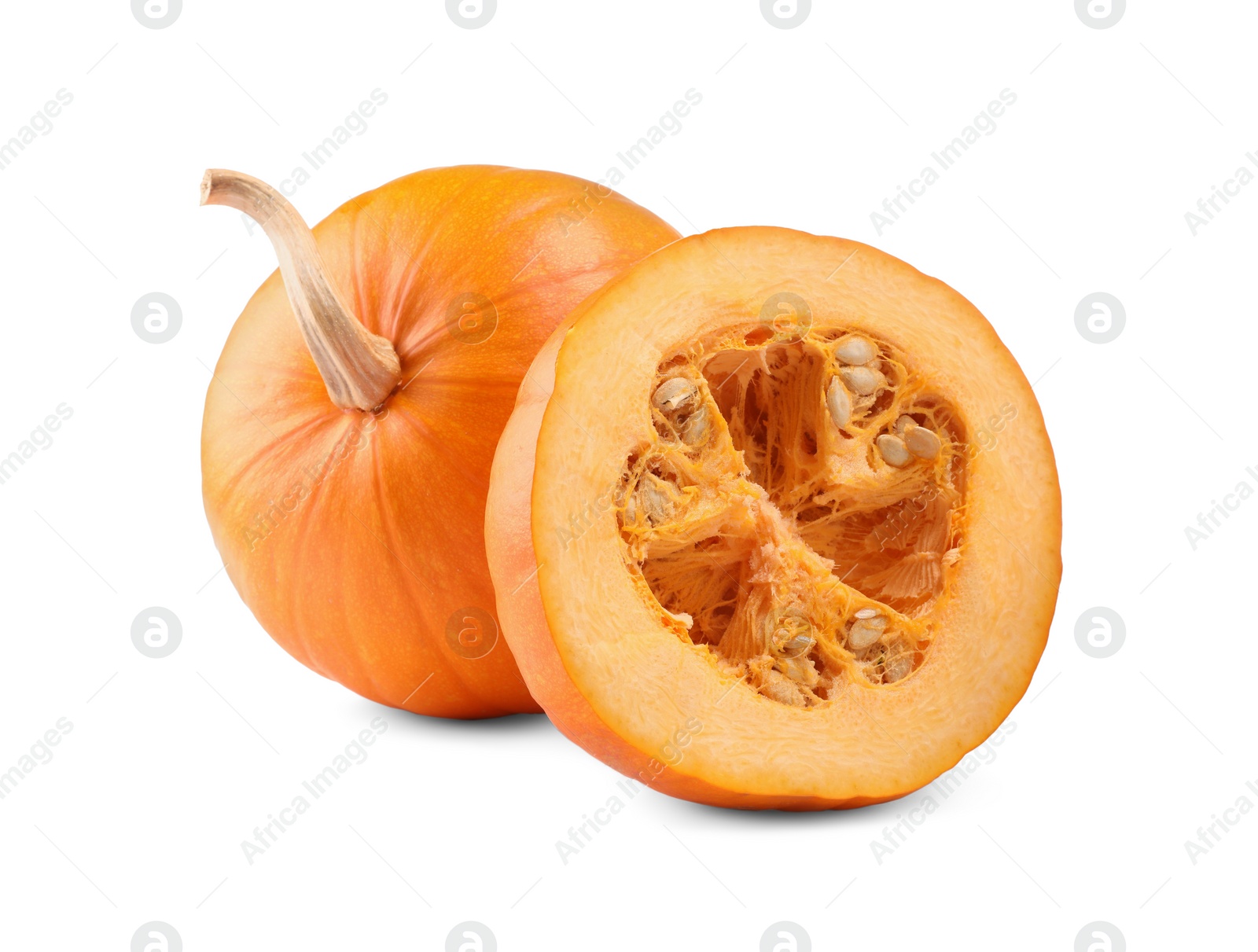 Photo of Whole and cut fresh ripe pumpkins isolated on white