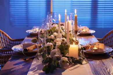 Photo of Festive table setting with beautiful tableware and decor indoors