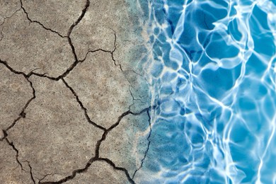 Image of Save environment. Water on dry cracked land, top view