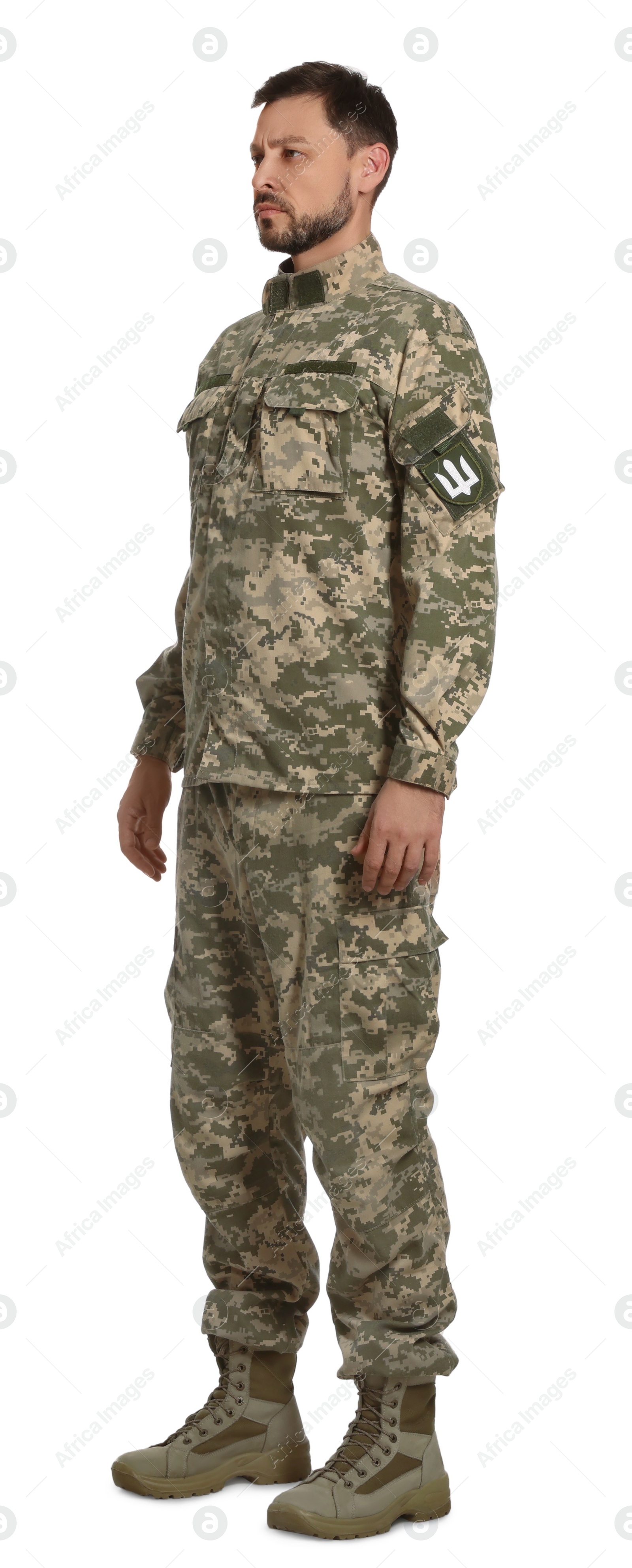 Photo of Ukrainian soldier in military uniform on white background