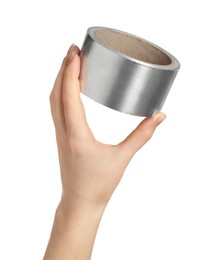 Photo of Woman holding silver adhesive tape on white background, closeup