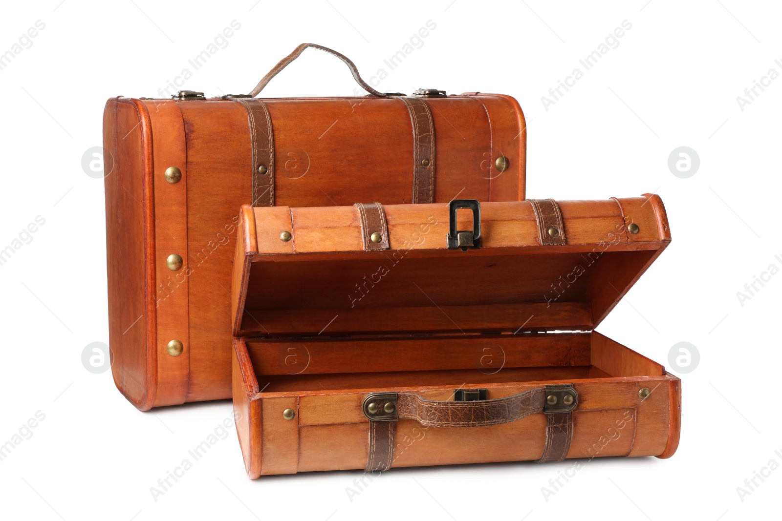 Photo of Beautiful brown vintage suitcases on white background