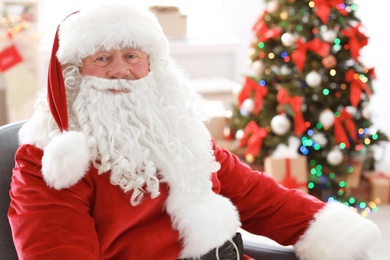 Authentic Santa Claus in traditional costume indoors