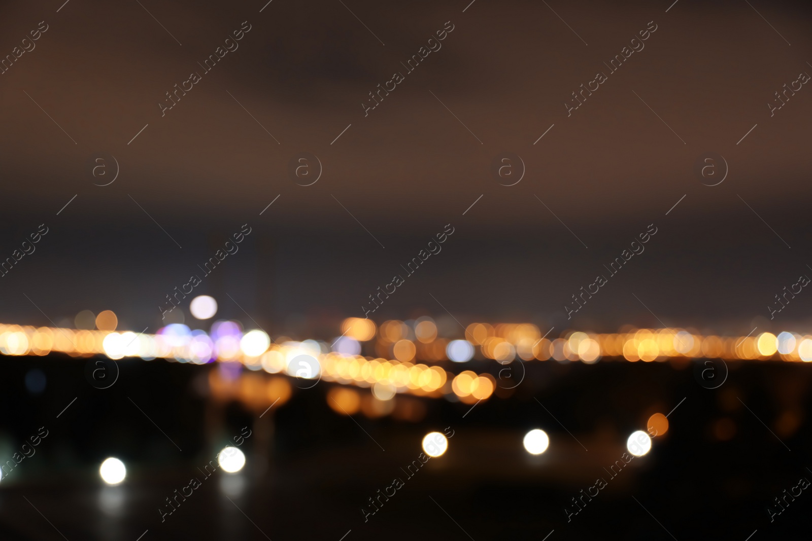 Photo of Blurred view of bridge with illumination in modern city at night