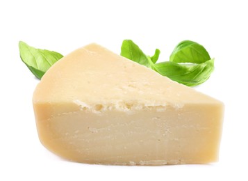 Delicious parmesan cheese and basil on white background