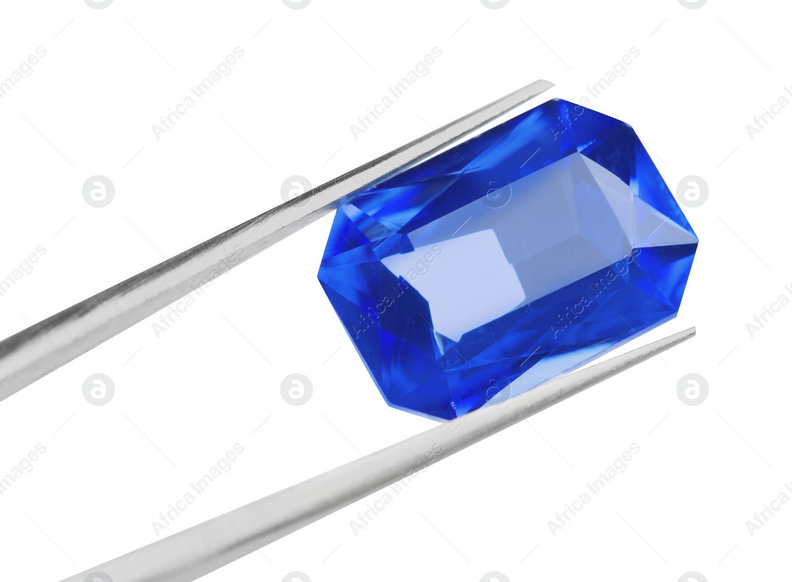 Photo of Tweezers with beautiful gemstone on white background