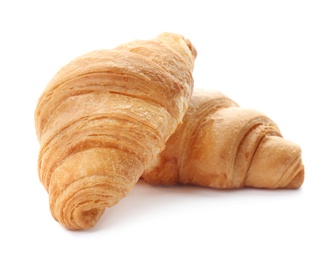 Tasty croissants on white background