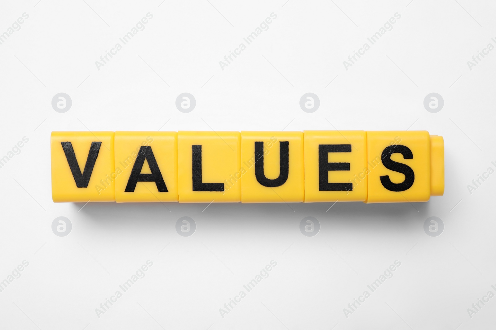 Photo of Blocks with word VALUES on white background, top view