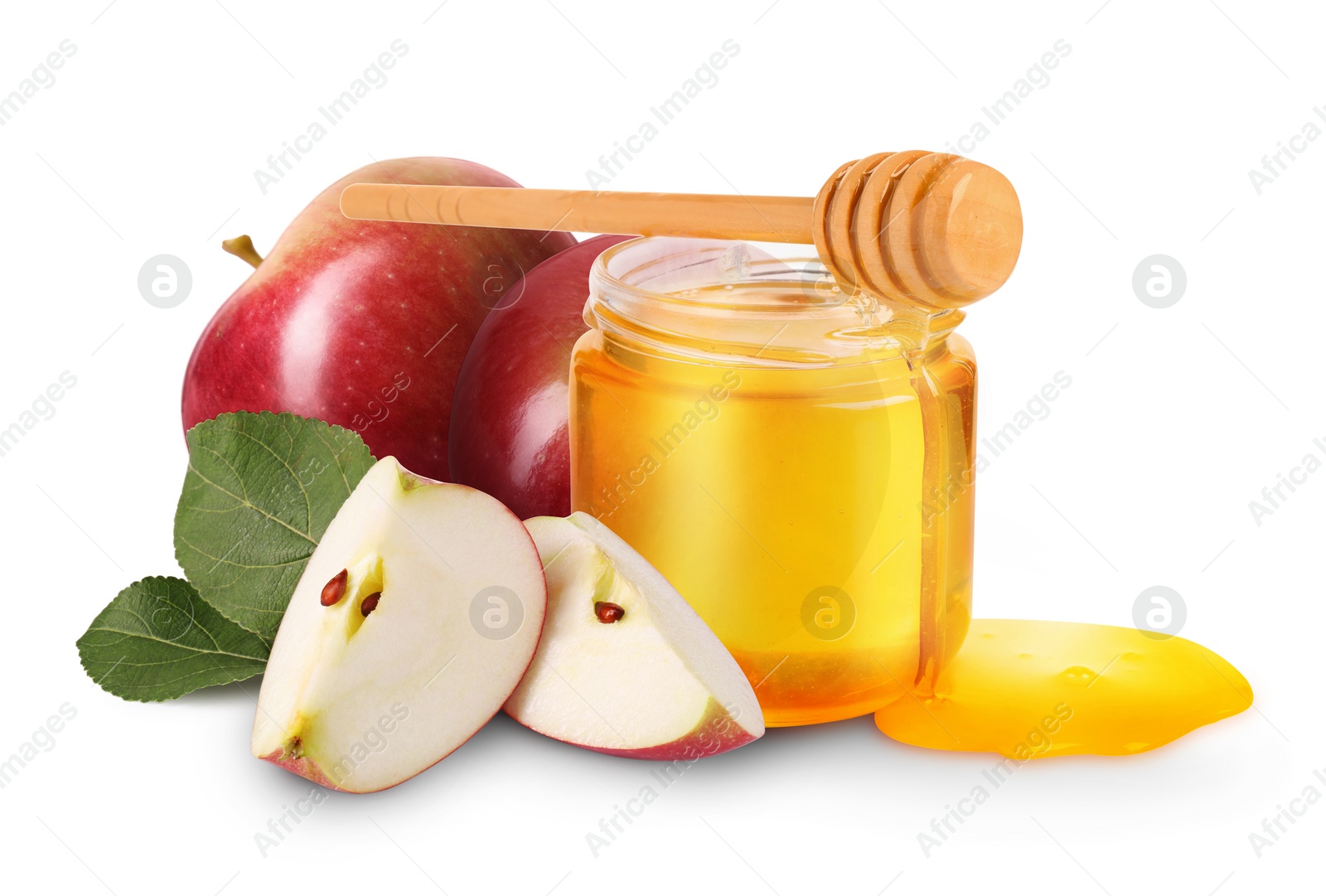 Image of Honey in glass jar, apples and dipper isolated on white