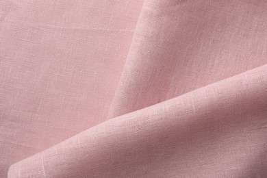 Texture of pink fabric as background, top view