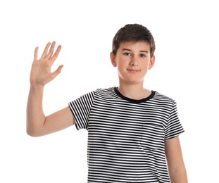 Photo of Happy teenage boy waving to say hello on white background