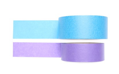 Photo of Rolls of adhesive tape on white background, top view