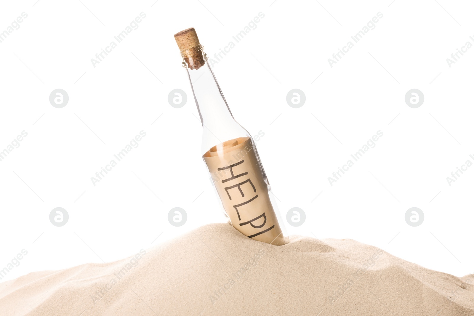 Photo of Corked glass bottle with Help note in sand on white background