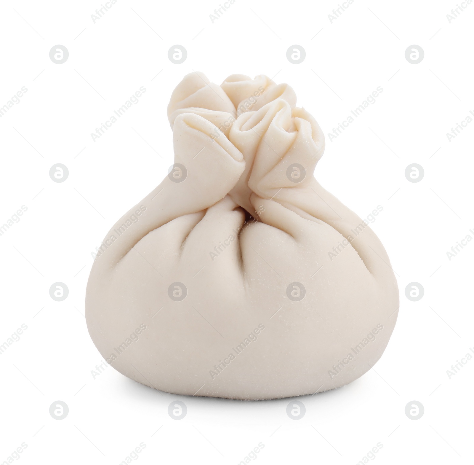 Photo of Uncooked khinkali (dumpling) isolated on white. Georgian cuisine