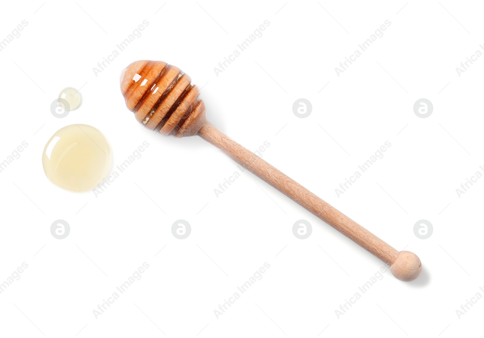 Photo of Tasty natural honey and dipper on white background, top view