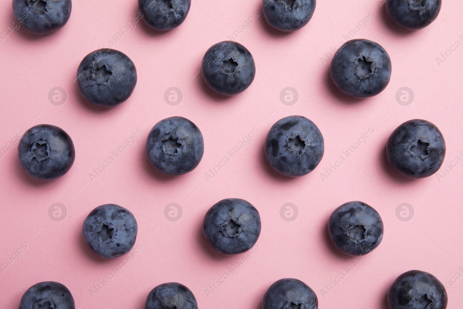 Photo of Flat lay composition with tasty blueberry on color background