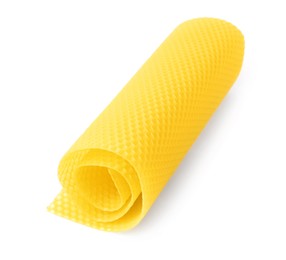 Rolled organic beeswax sheet isolated on white