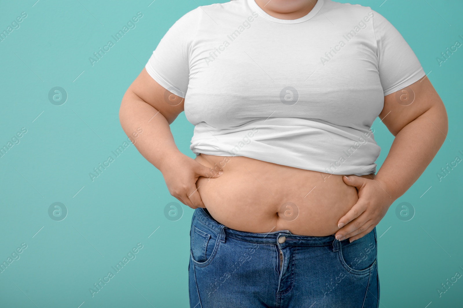 Photo of Overweight woman on color background