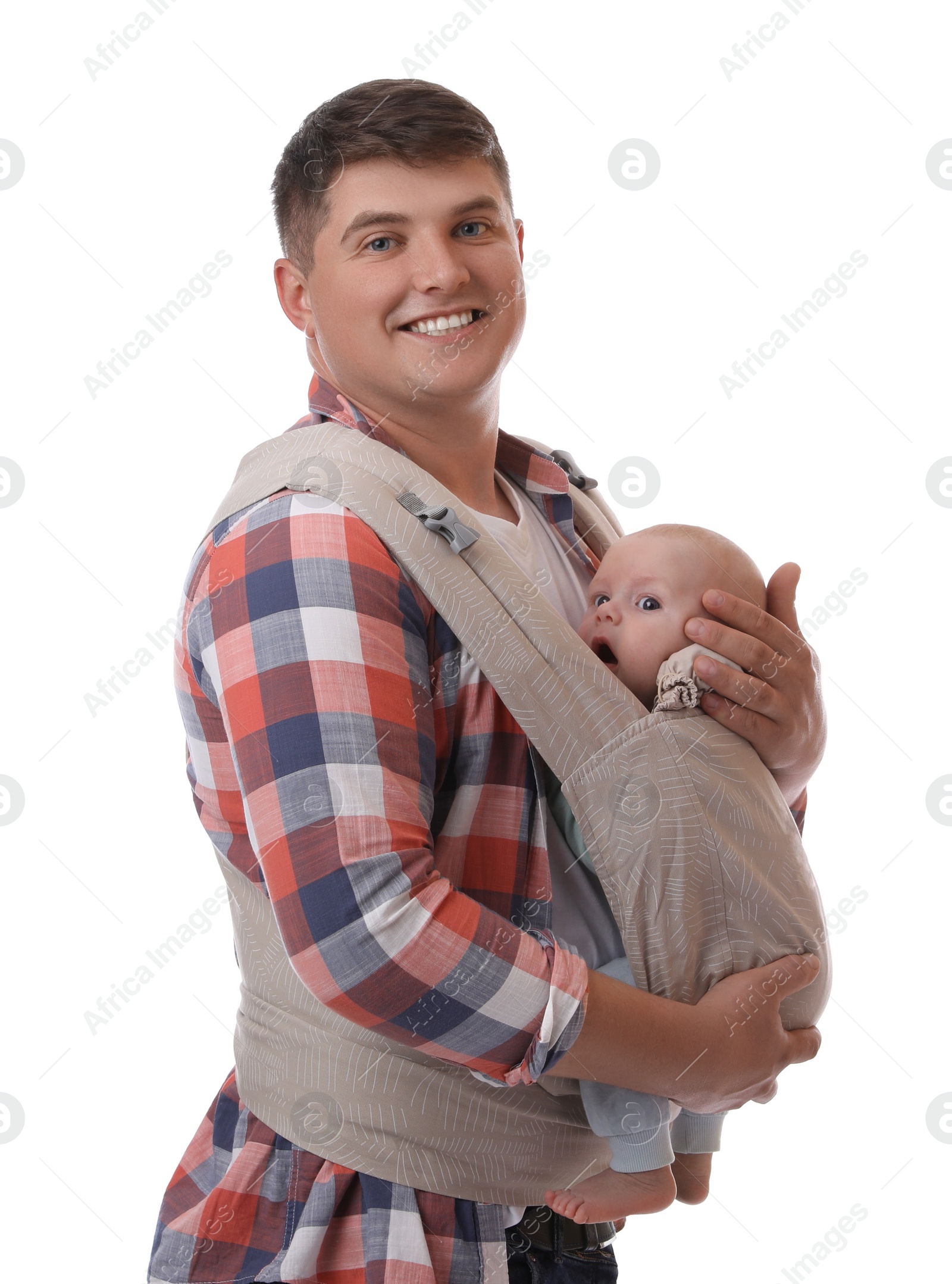 Photo of Father holding his child in baby carrier on white background