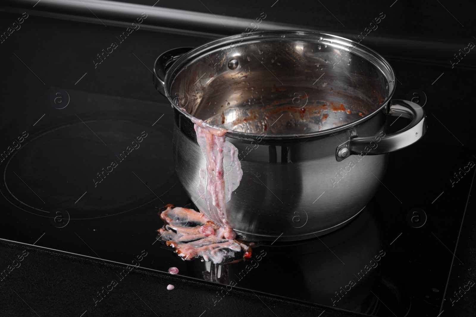 Photo of Dirty pot on cooktop in kitchen, space for text