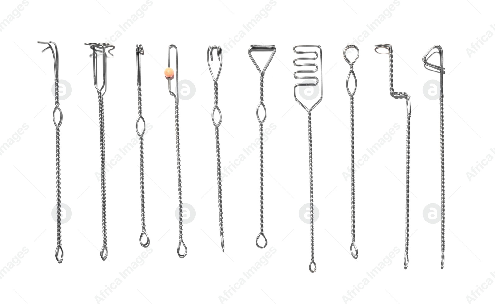 Photo of Set of logopedic probes on white background, top view. Speech therapist's tools