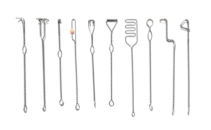 Photo of Set of logopedic probes on white background, top view. Speech therapist's tools