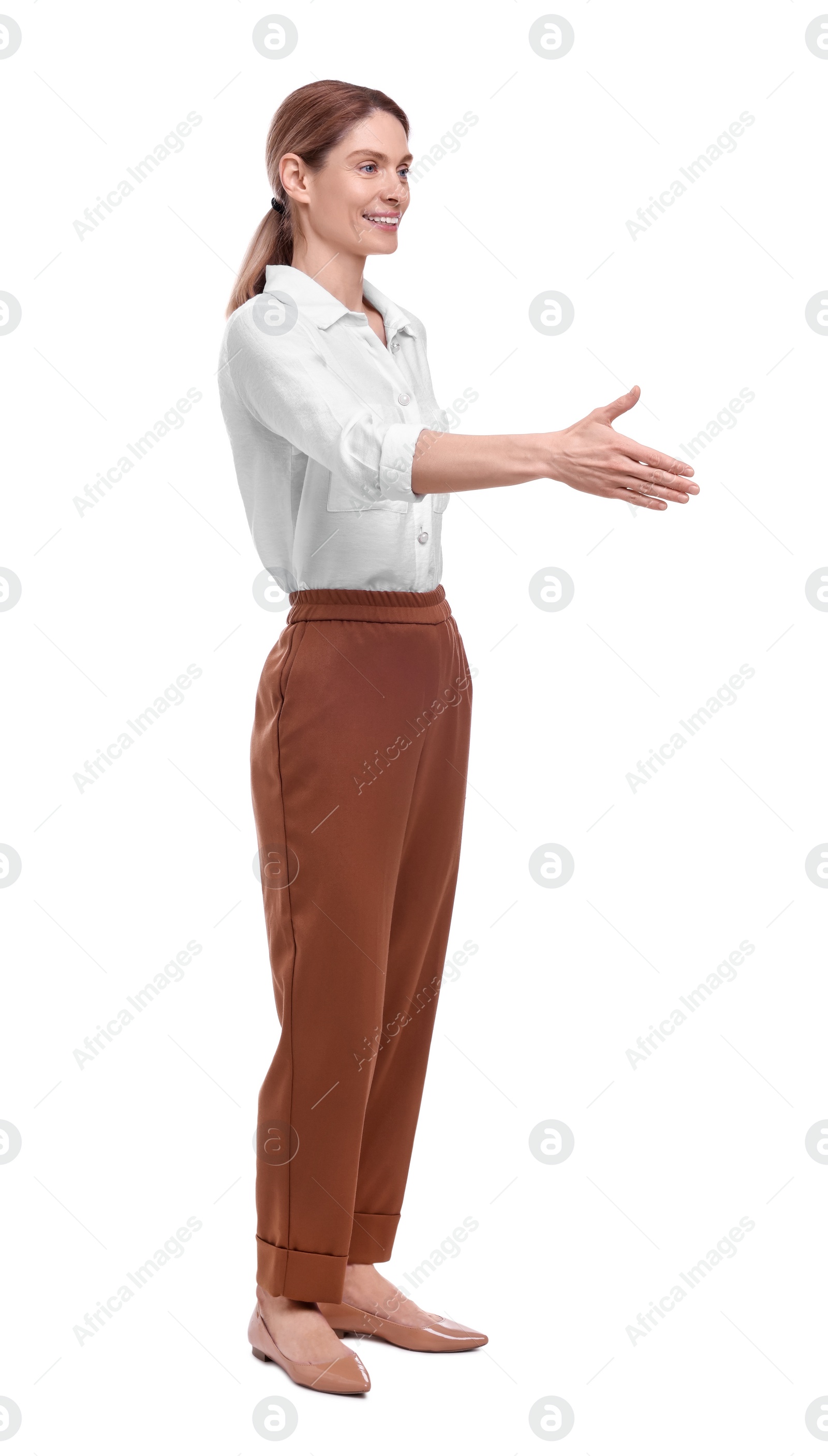 Photo of Beautiful happy businesswoman giving handshake on white background