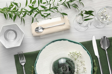 Photo of Elegant festive setting on white wooden table, flat lay