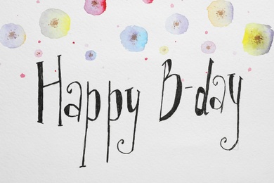 Photo of Words HAPPY BIRTHDAY and color flowers pictures on white paper, top view