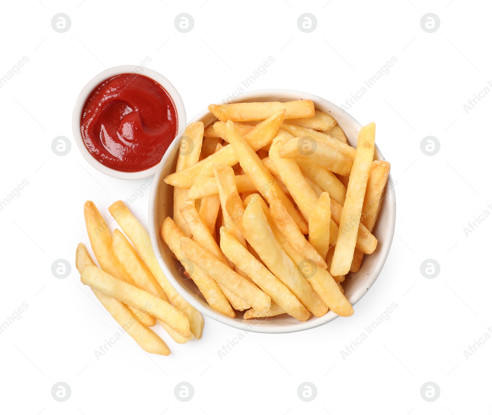 Photo of Bowl with tasty French fries and ketchup on white background, top view