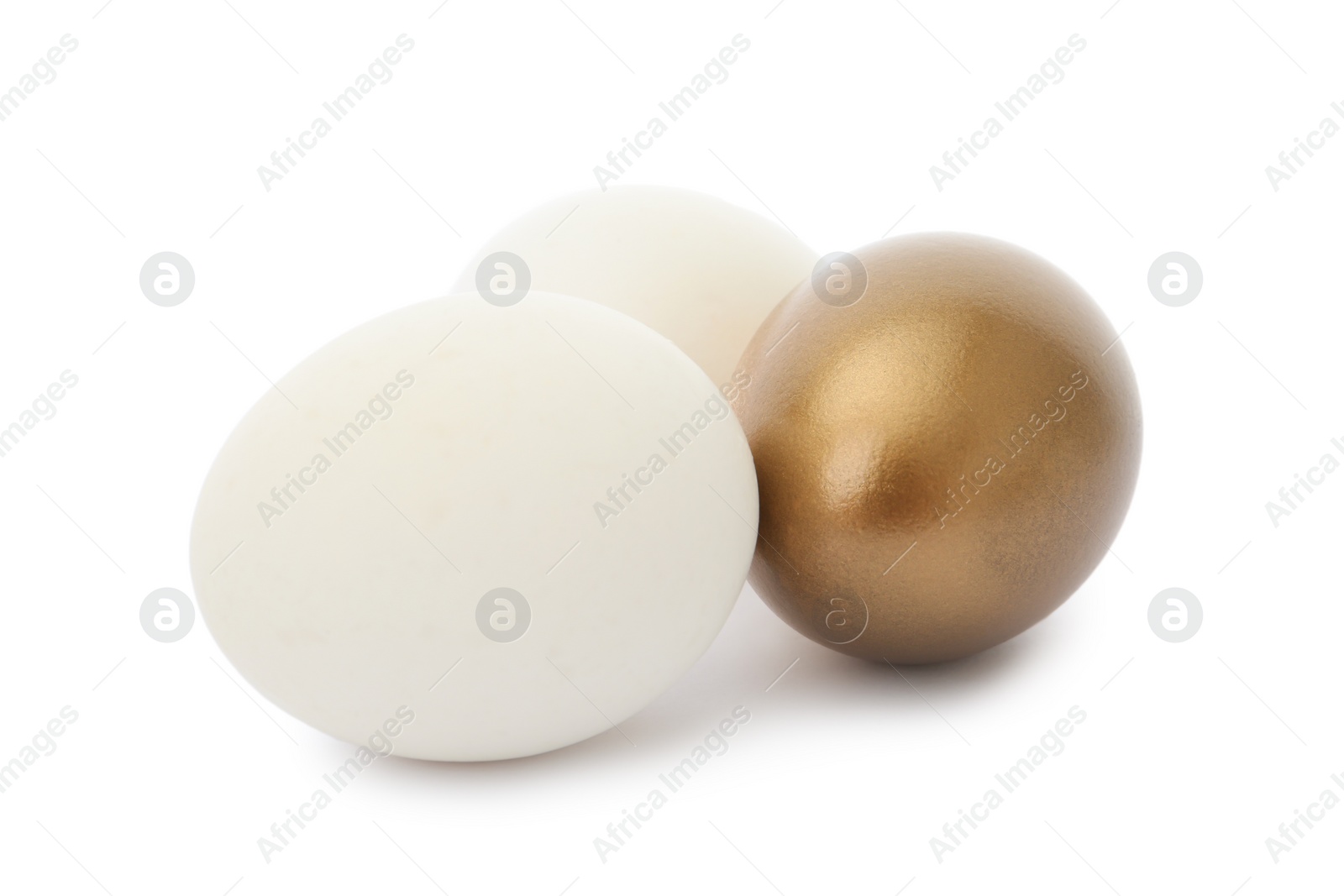 Photo of Golden egg among ordinary ones on white background