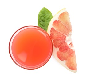 Photo of Glass of pink pomelo juice, fruit and green leaf isolated on white, top view