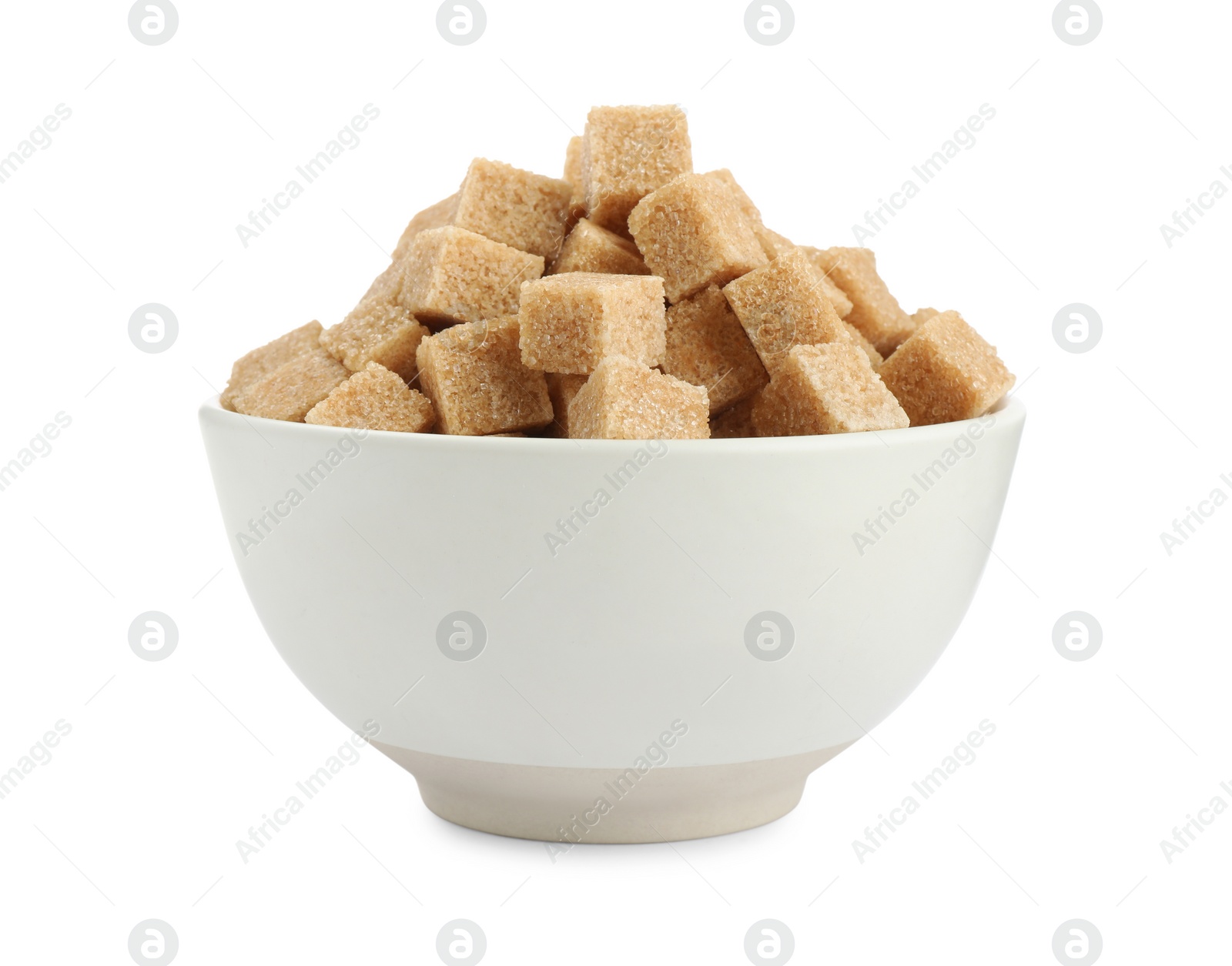 Photo of Bowl with cubes of brown sugar isolated on white